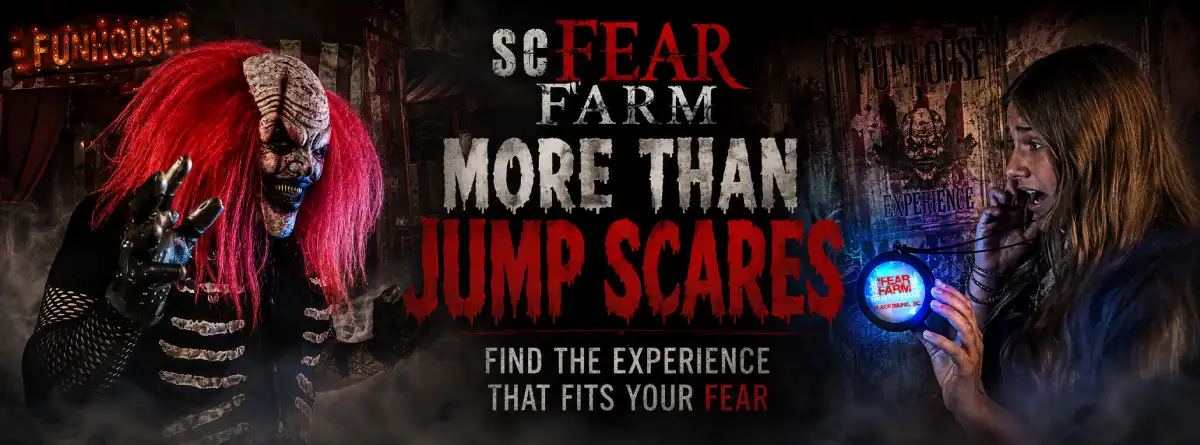 Friends approaching a foggy haunted trail while comparing Greenville-area Halloween attractions